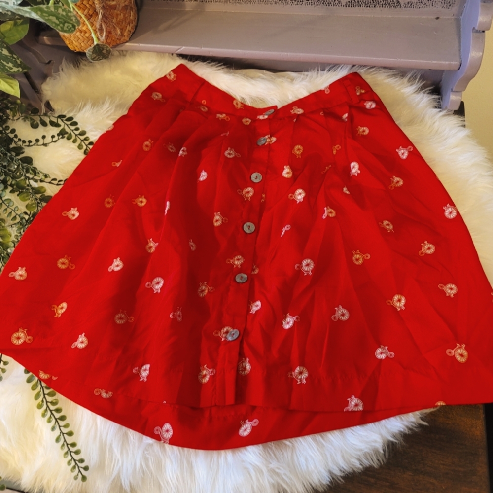 Cute flowy skirt with bicycle pattern has pockets!